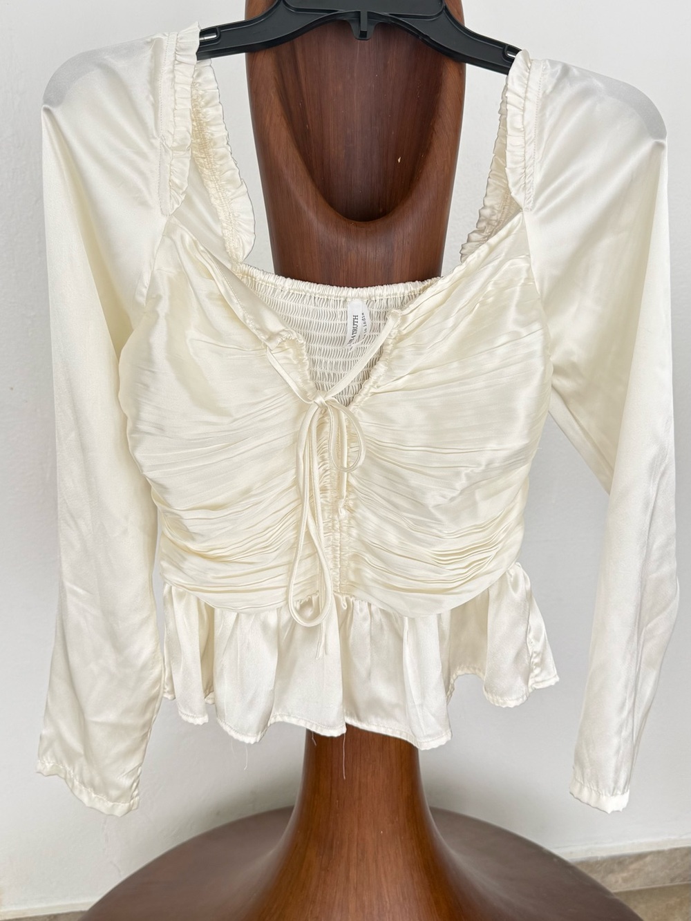 Live 4 Truth Satin Ivory Ruched Peplum Long Sleeve Top